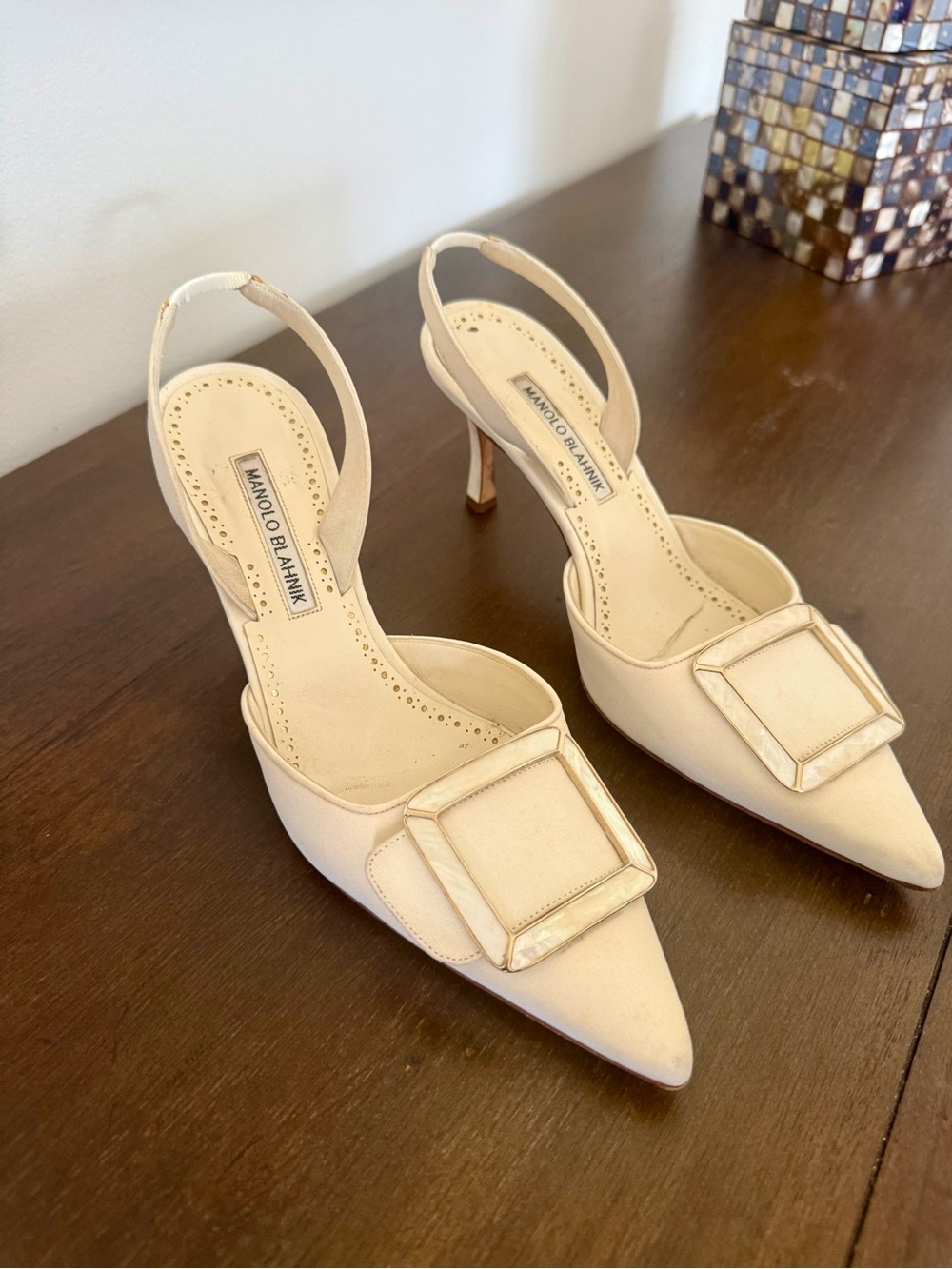 Manolo Blahnik Cream Pointed Toe Slingback Heels with Decorative Buckle